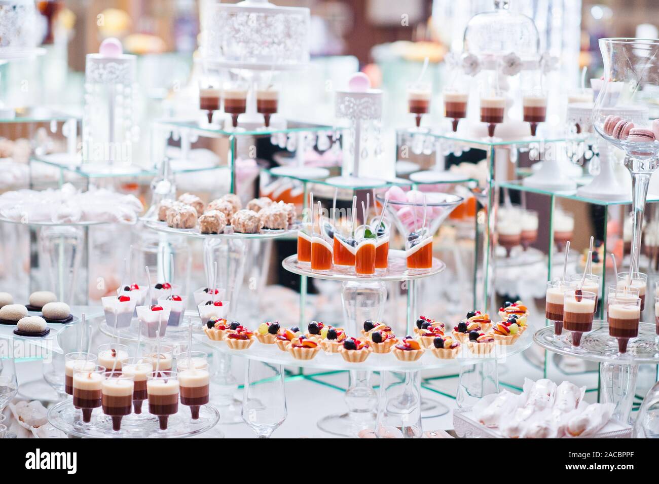 Dessert Table Of Delicious Sweets On Wedding Reception Stock Photo