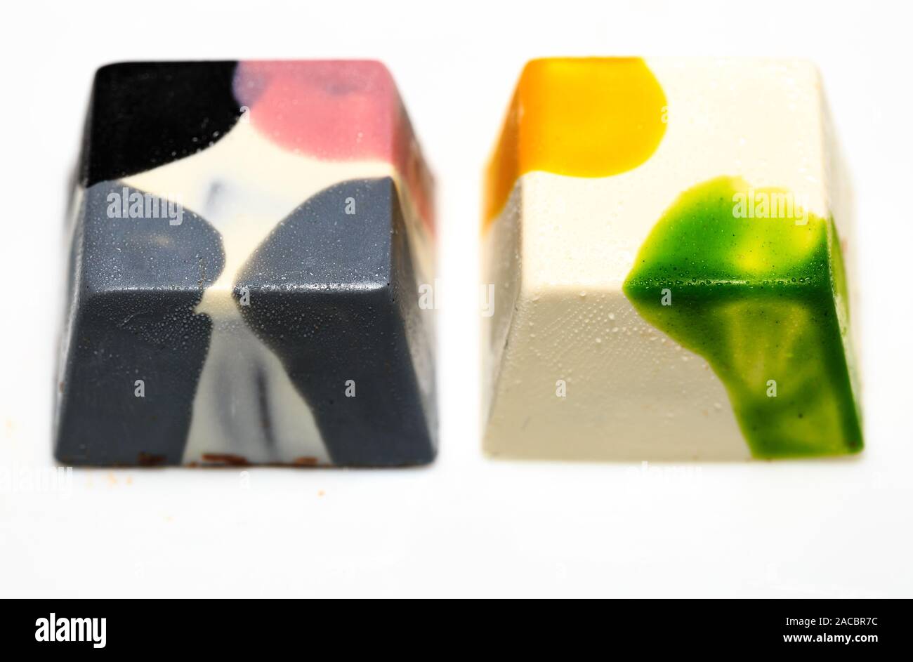 beautiful chocolate cubes placed on white background Stock Photo