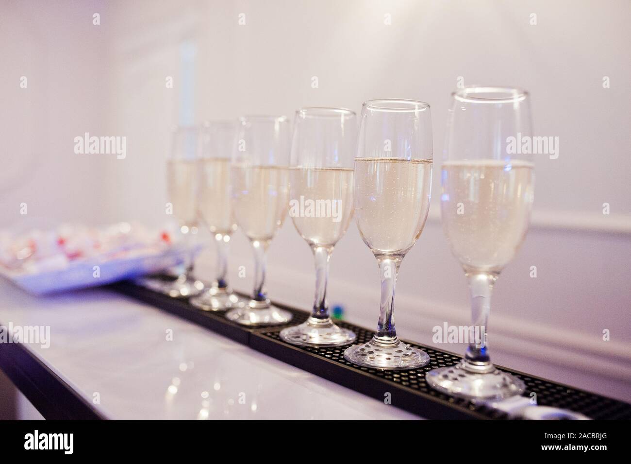 Dessert Table Of Champagne Glasses On Wedding Reception Stock