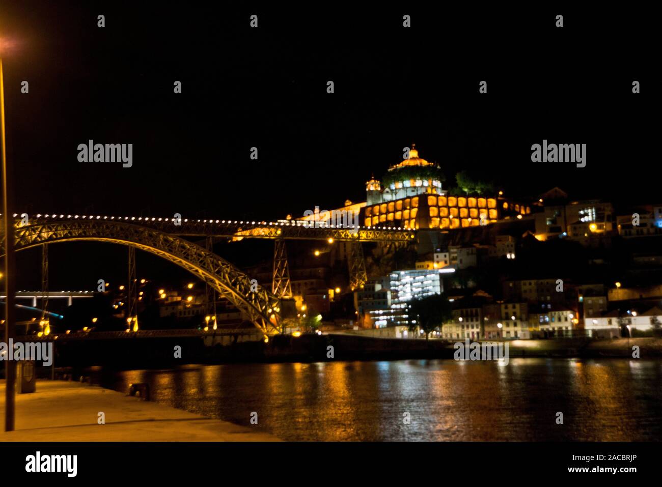 Ponte Luis Bridge at night low angle from Porto Stock Photo