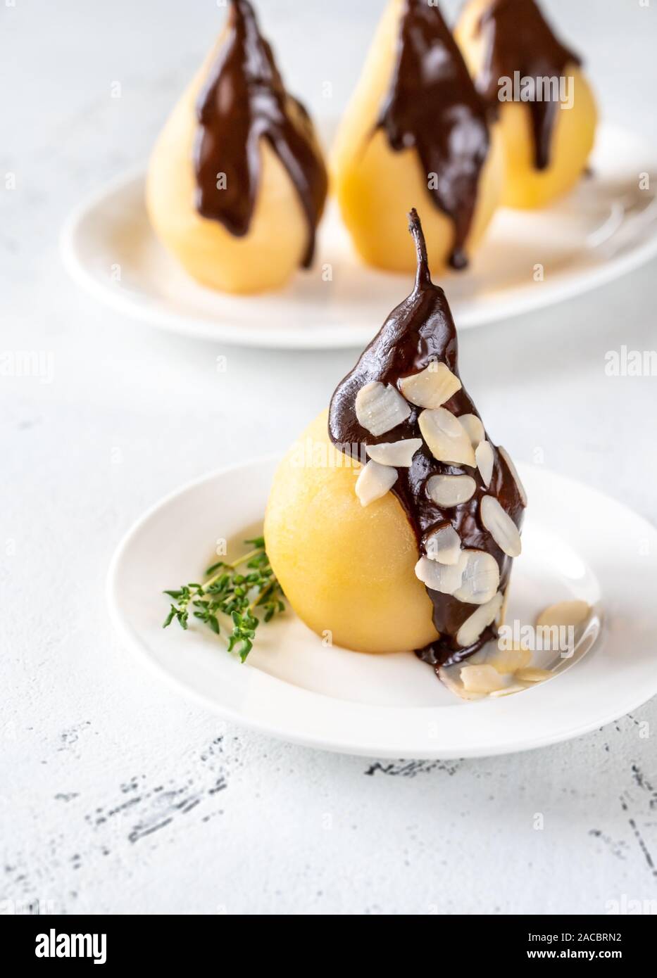 Poire Belle Helene French Dessert Made From Poached Pear Served With Chocolate Syrup Stock Photo Alamy Poire Belle Helene French Dessert Made From Poached Pear Served With Chocolate Syrup Stock Photo Alamy