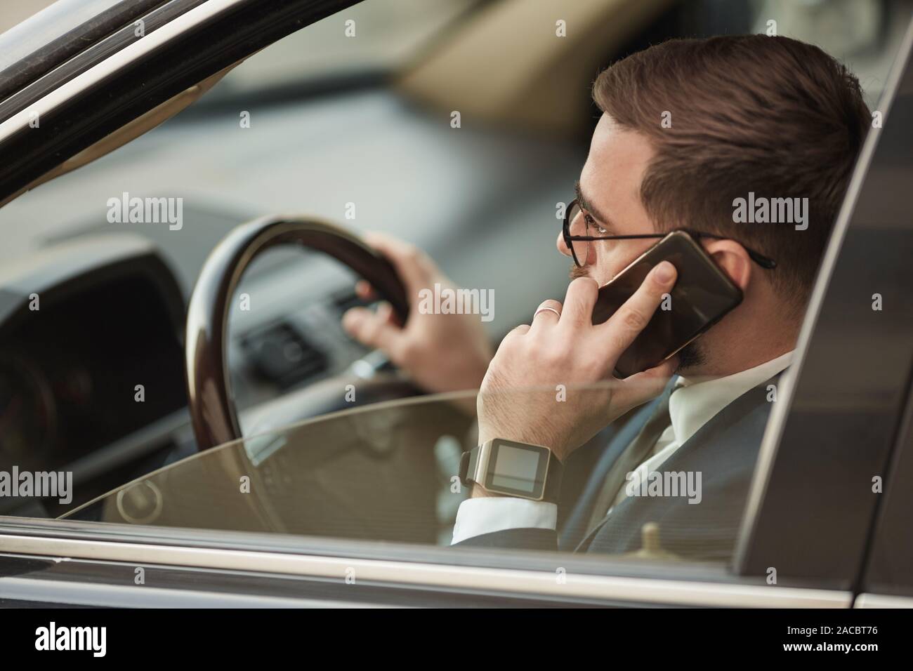 Businessman steering wheel hi-res stock photography and images - Alamy