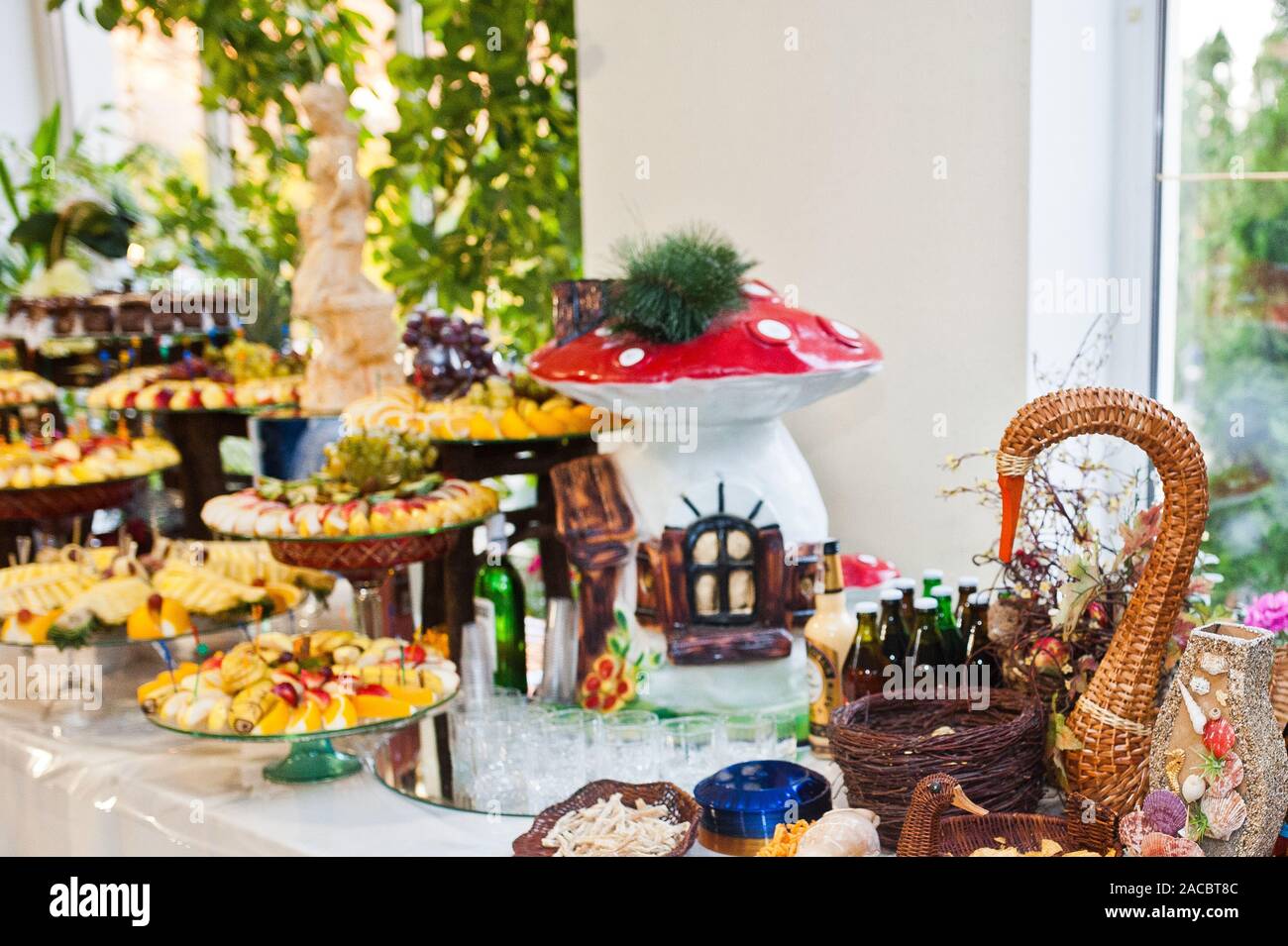 Dessert Table Of Delicious Sweets On Wedding Reception Stock Photo