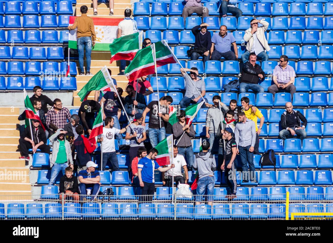 SAINT-PETERSBURG, RUSSIA - AUGUST 1: Fans of Football Club Terek Grozny at the match of Championship of Russia with Zenit on August 1, 2015 in Saint-P Stock Photo