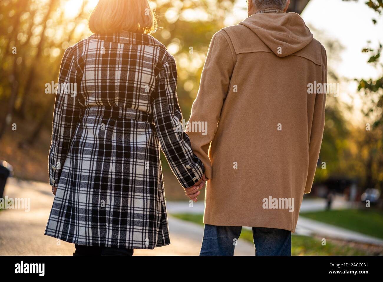 Loving couple walking in park hi-res stock photography and images - Alamy