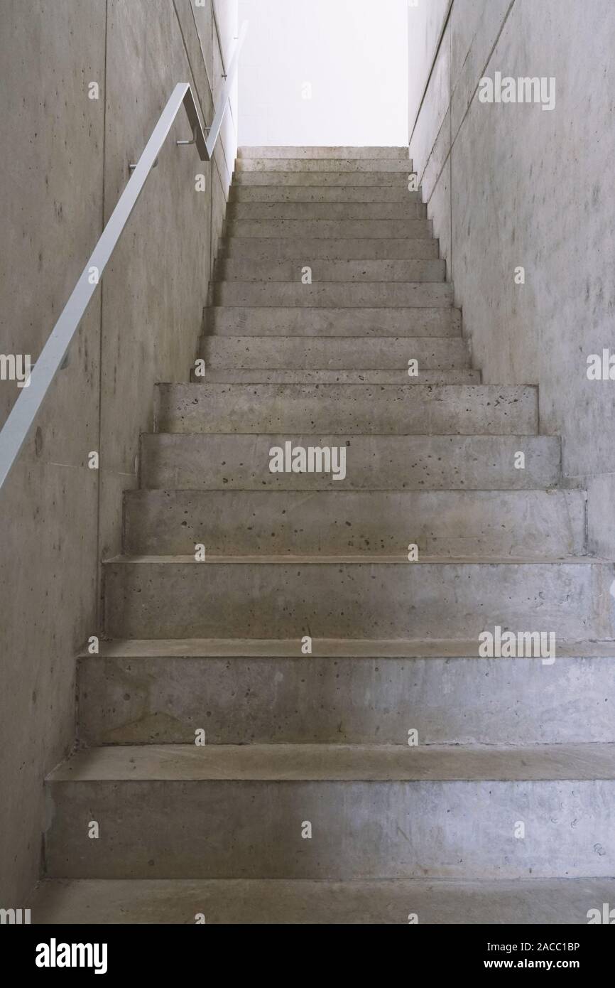 empty concrete staircase or cement stairs, modern contemporary architecture or way up concept Stock Photo