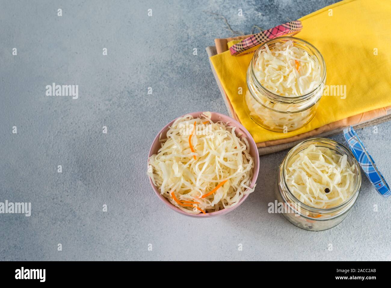 fermented sauerkraut village vegan salad in a glass jar. healthy