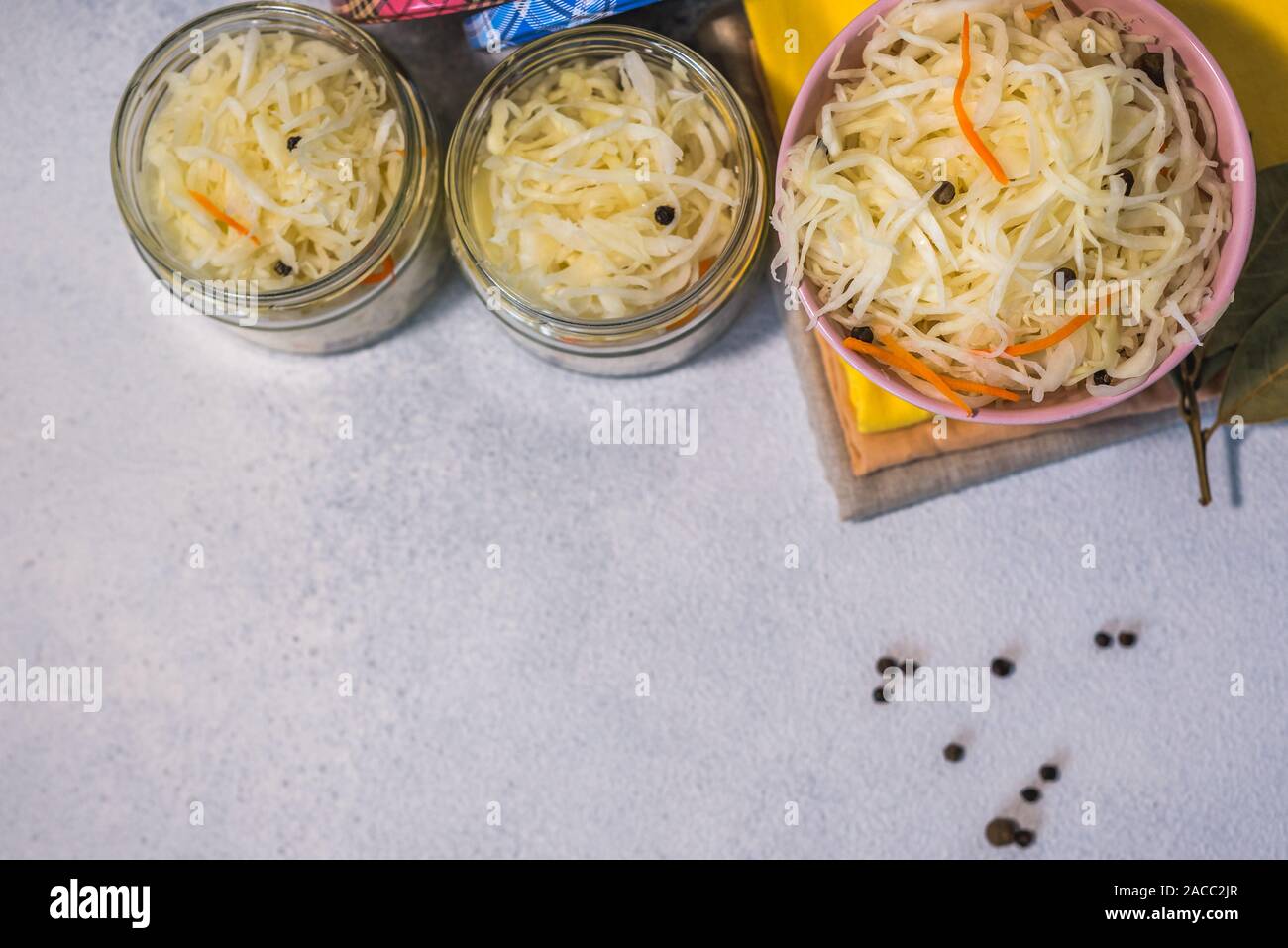 fermented sauerkraut village vegan salad in a glass jar. healthy