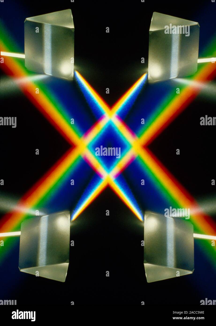 Multiple exposure of white light through a triangular prism. Stock Photo