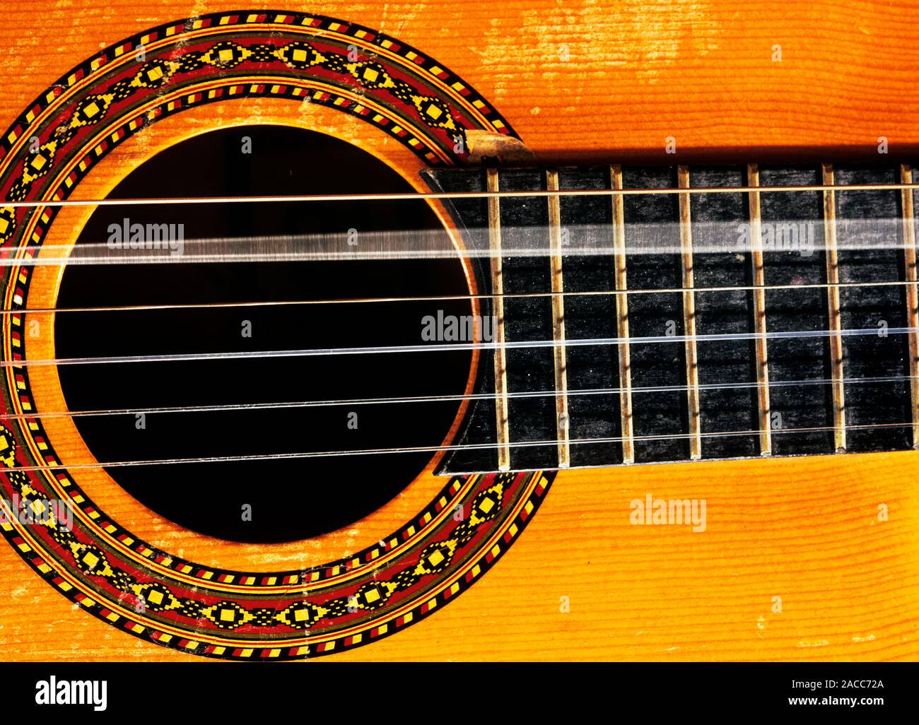 Guitar string vibrating. When plucked, the string vibrates at a