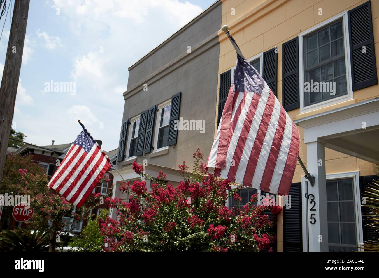 american flags flying outside historic homes for the fourth of july