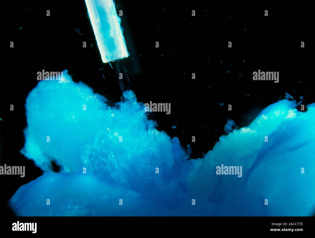 Precipitation of copper (II) hydroxide. A solution of copper sulphate