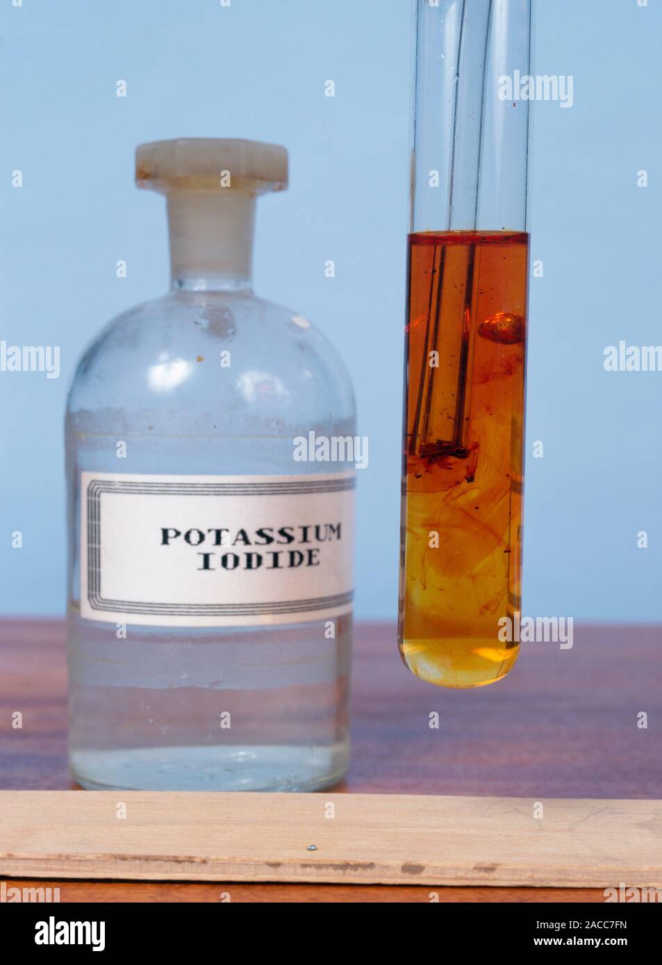Chlorine displacing iodine. Chlorine gas bubbling through an aqueous