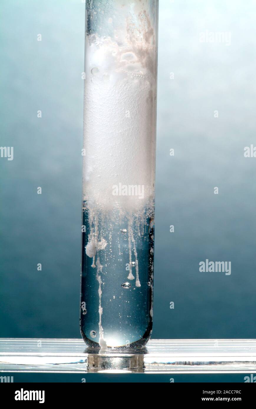 Magnesium carbonate reacting with hydrochloric acid. This reaction