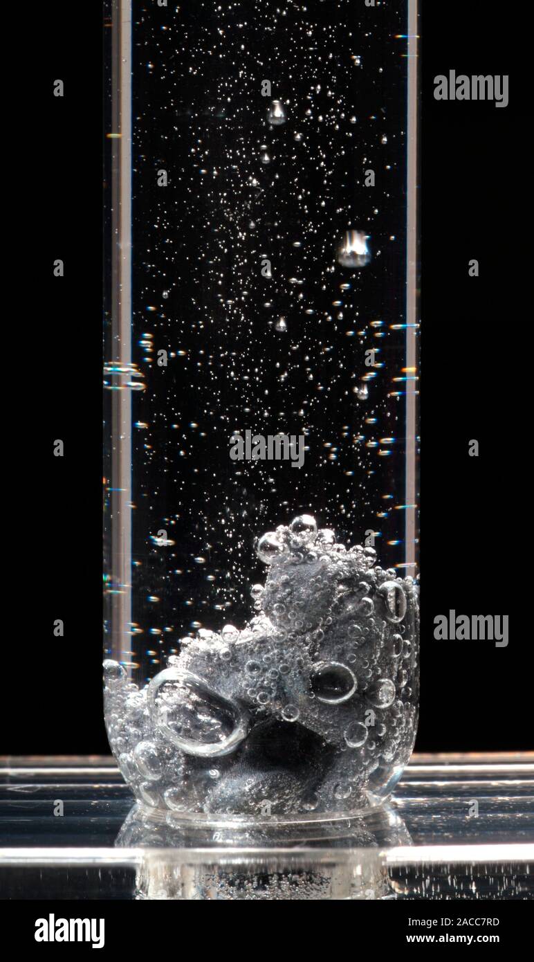 Zinc reacting with hydrochloric acid. This reaction forms the soluble
