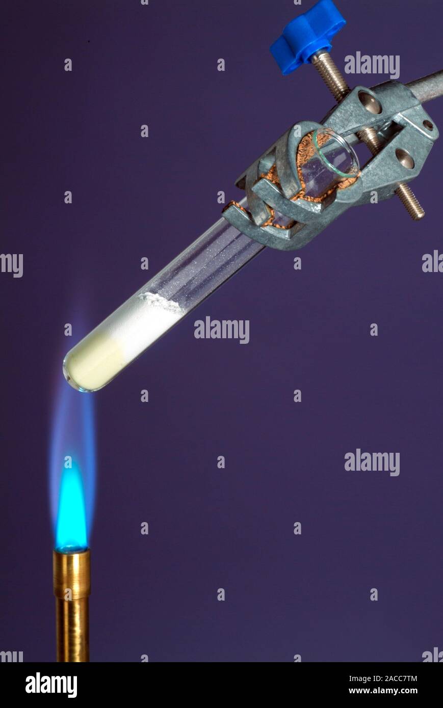 Zinc oxide being heated in the flame of a bunsen burner. When heated, white zinc oxide turns