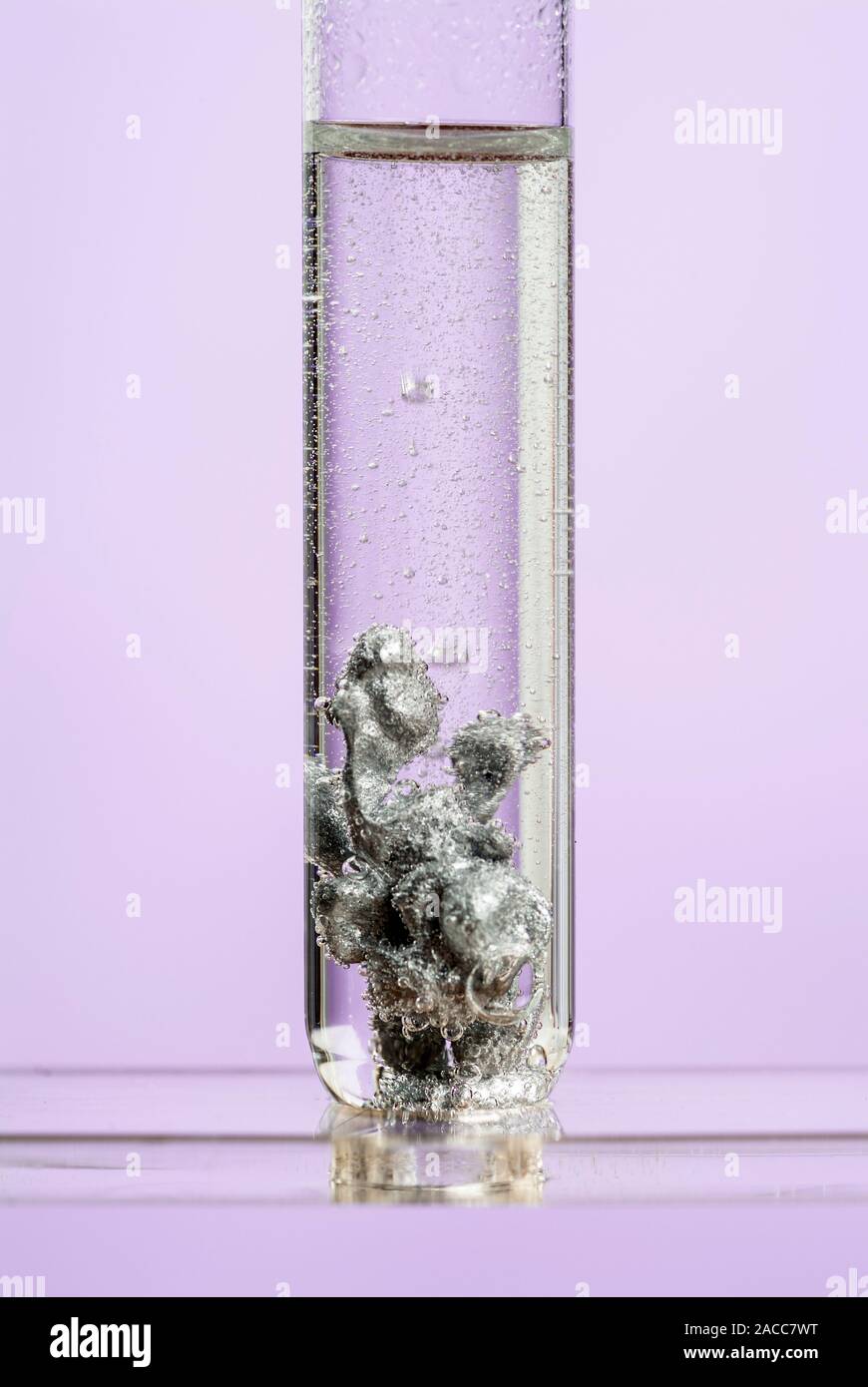 Zinc reacting with sulphuric acid. This reaction leads to the formation