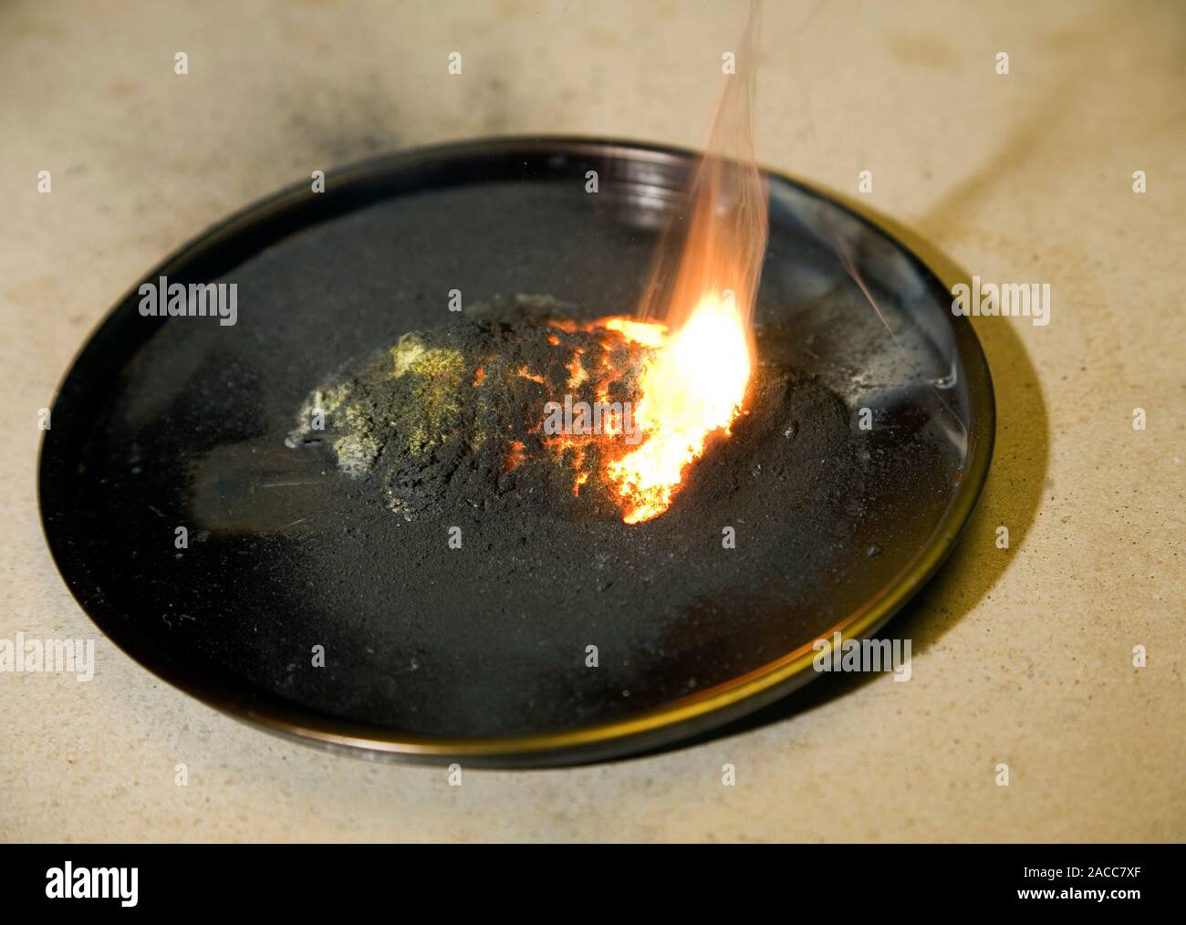 Copper oxide and zinc, undergoing an exothermic displacement reaction