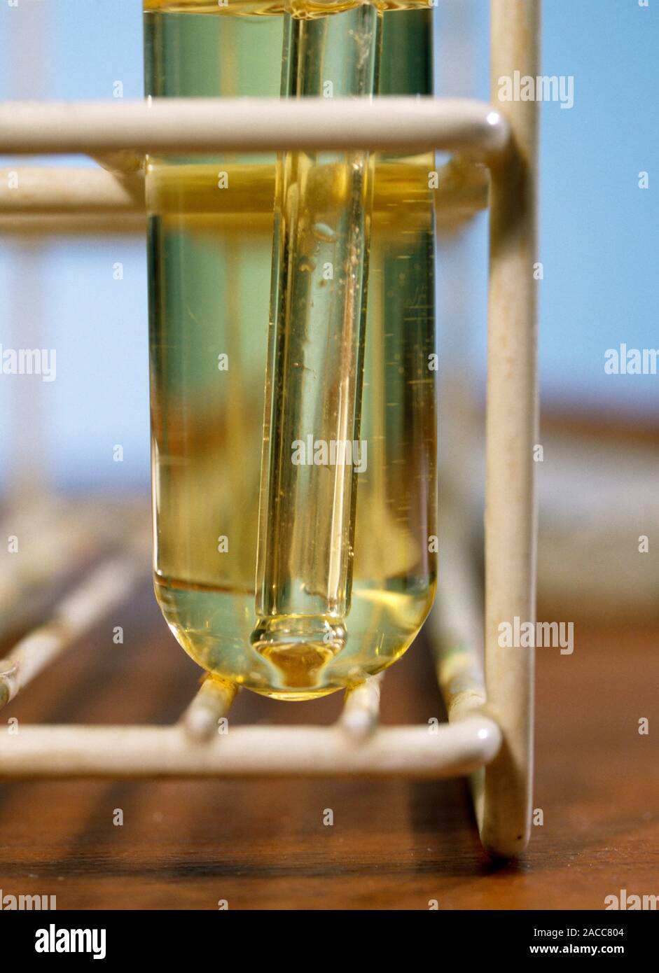Alkene decolourisation of bromine water. Image 2 of 3. Middle of the reaction of bromine water