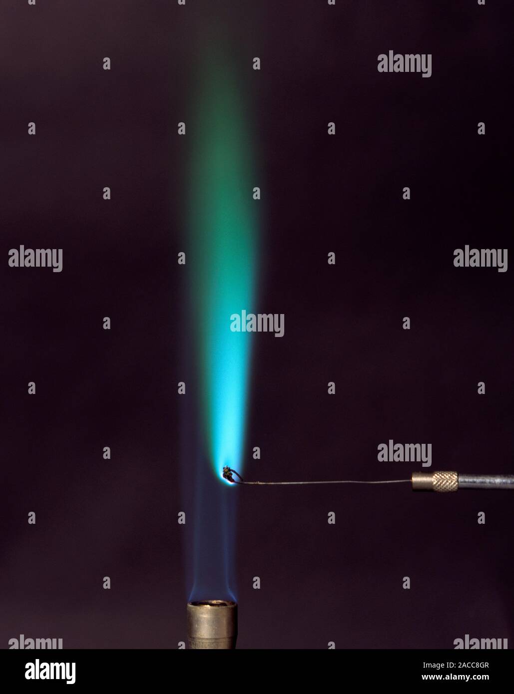 Flame test for copper. A compound containing the element copper (symbol