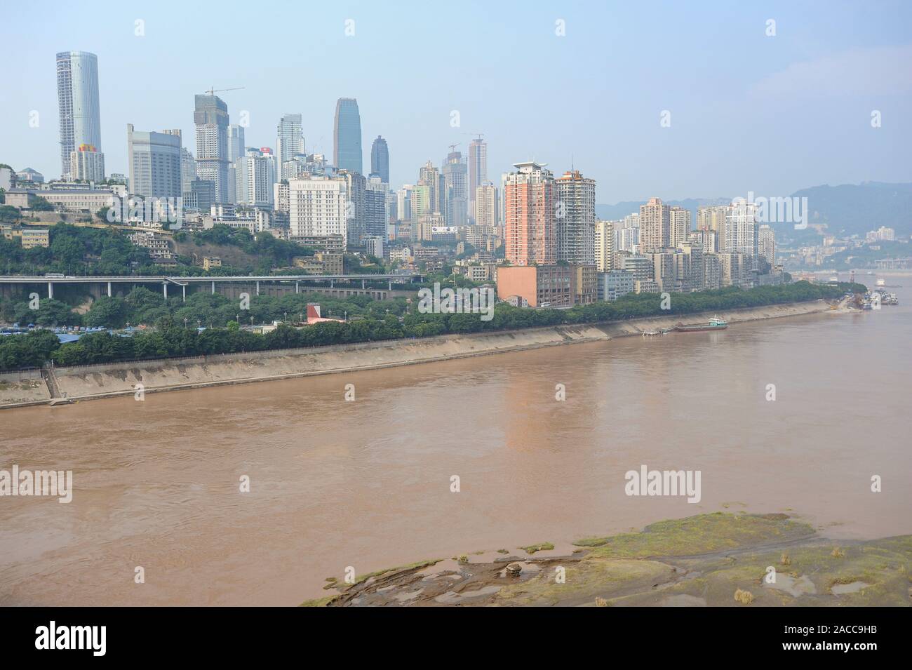 04.08.2012, Chongqing, China - Elevated view of the city on the shore of the Yangtze River. The megacity is situated at the confluence of two rivers. Stock Photo