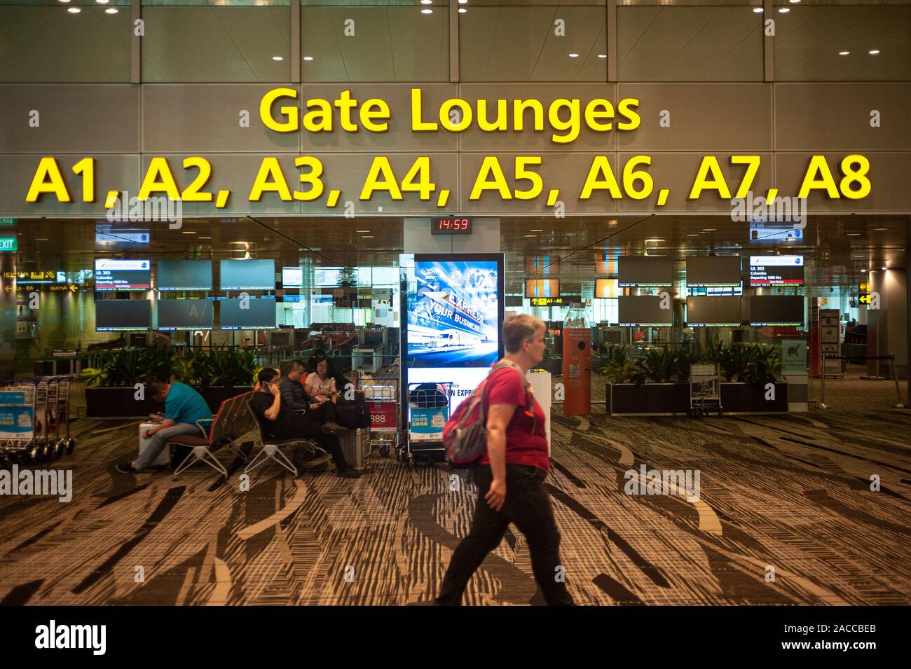 19.11.2019, Singapore, Republic of Singapore, Asia - Passengers inside Terminal 3 at Changi Airport. Stock Photo