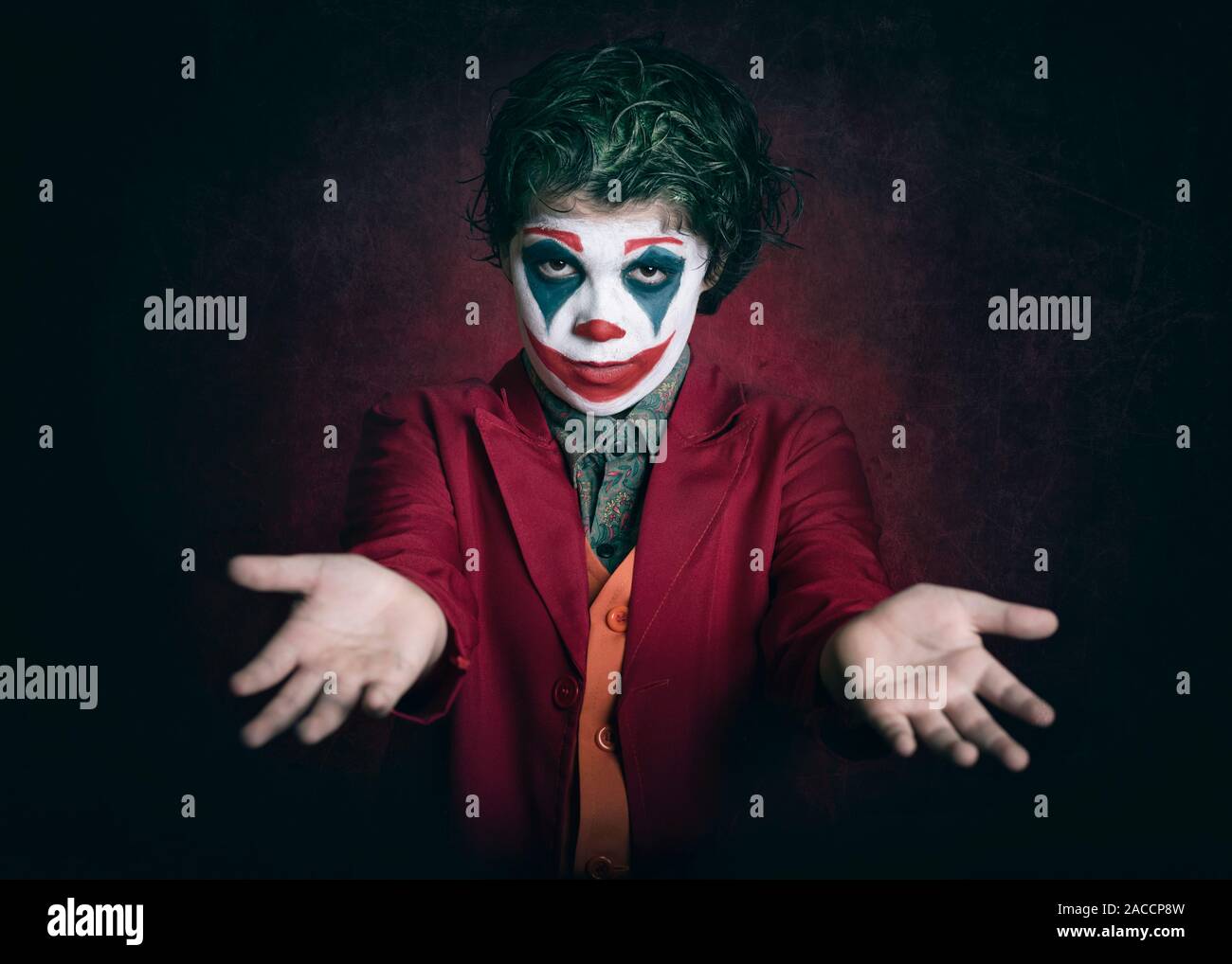 Boy Dressed As Joker On Dark Background Stock Photo Alamy