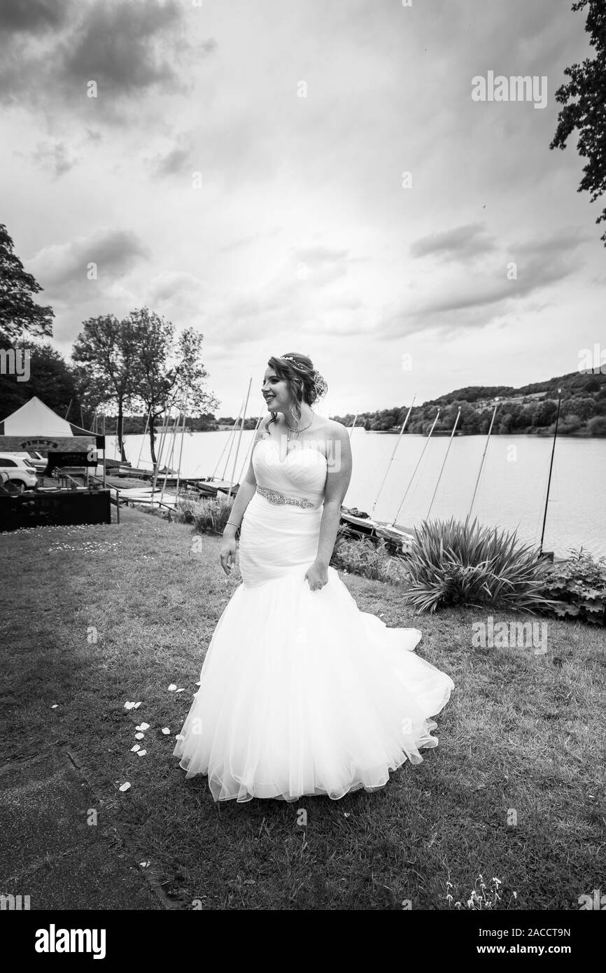 A gorgeous smiling, laughing happy bride after taking her vowels to her husband for a life happy ever after, Wedding photos, wedding photography Stock Photo