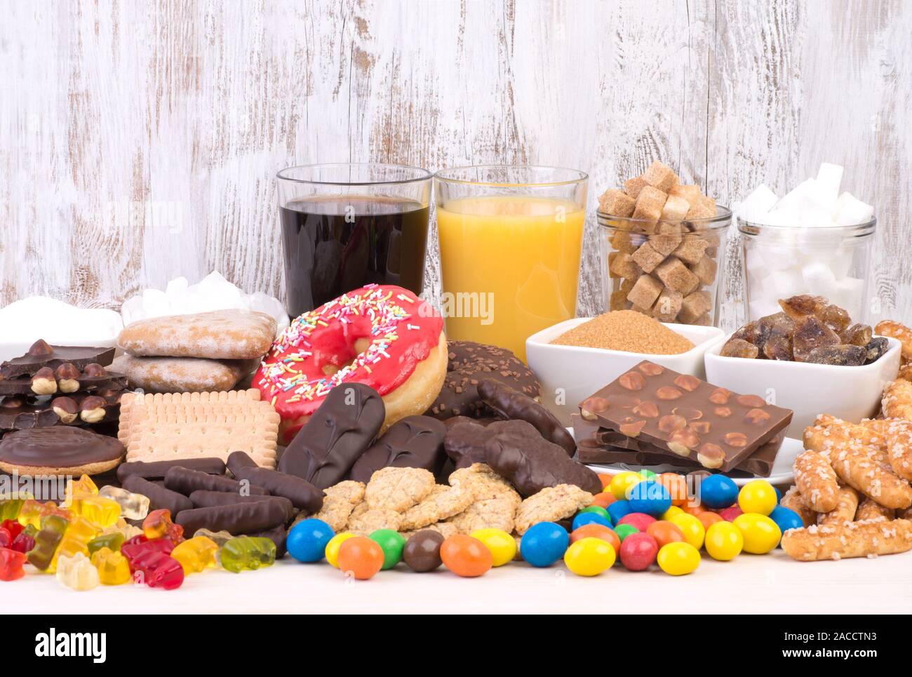 Food containing too much sugar. Sugar in diet causes obesity, diabetes and other health problems Stock Photo
