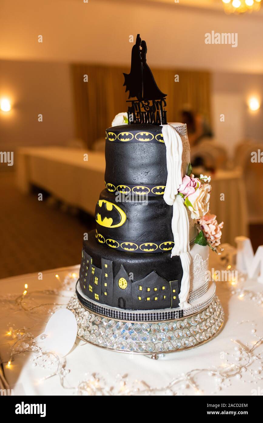A Stunning Traditional But Fun Batman Wedding Cake A Half And Half Cake Made For The Special Wedding Occasion Tasty And Elegant Stock Photo Alamy