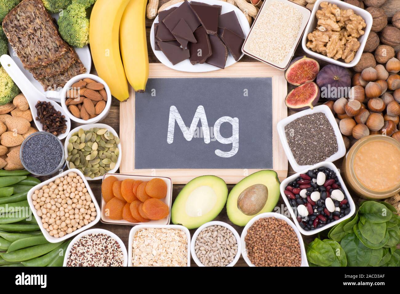 Magnesium food sources, top view on wooden background Stock Photo Alamy
