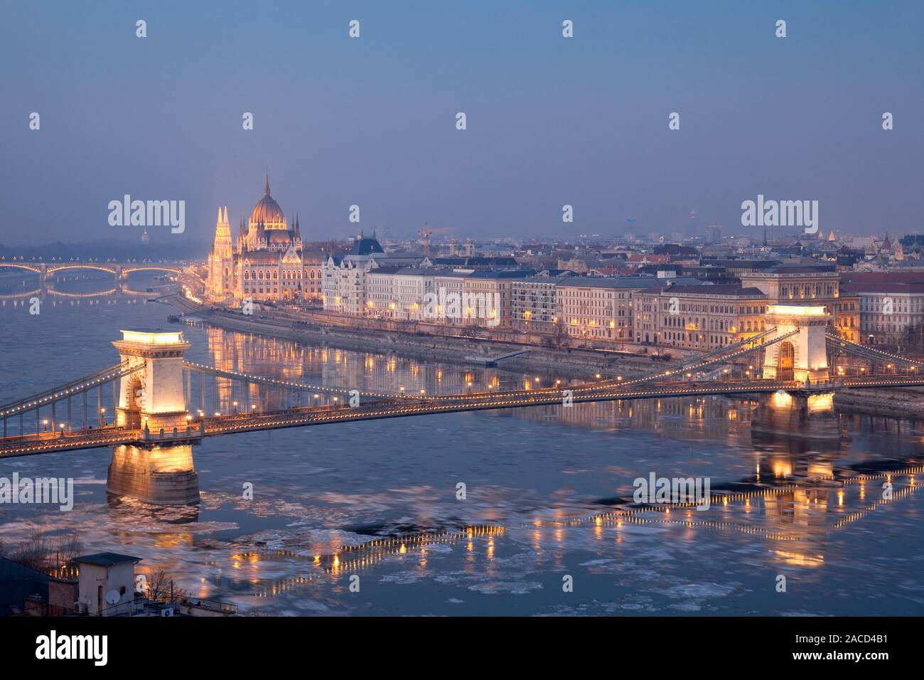 Chain Bridge with Hungarian Parliament Building and Danube by night, Budapest, Hungary Stock Photo