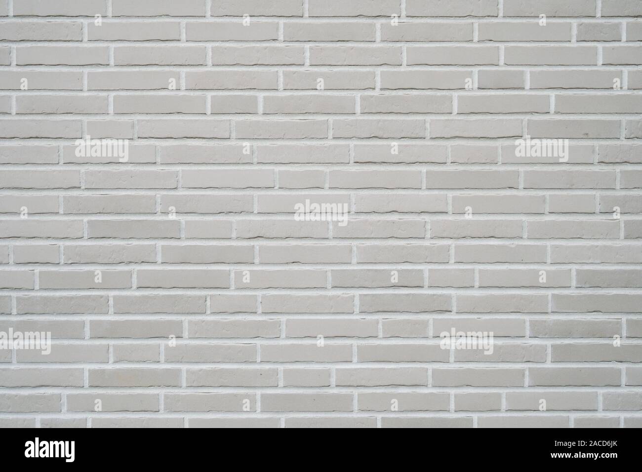 gray clinker brick wall background - modern building exterior with brick slip cladding Stock Photo