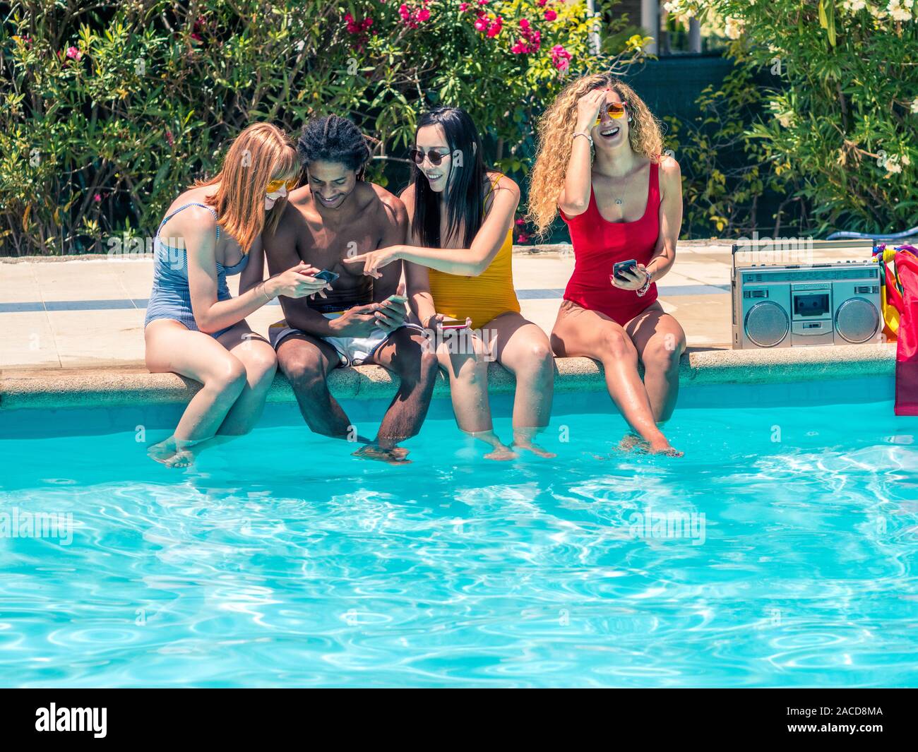 In Bathing Suits At A Swimming Pool High Resolution Stock Photography