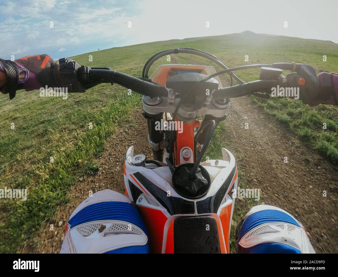 Enduro journey with dirt bike high in the mountains Stock Photo