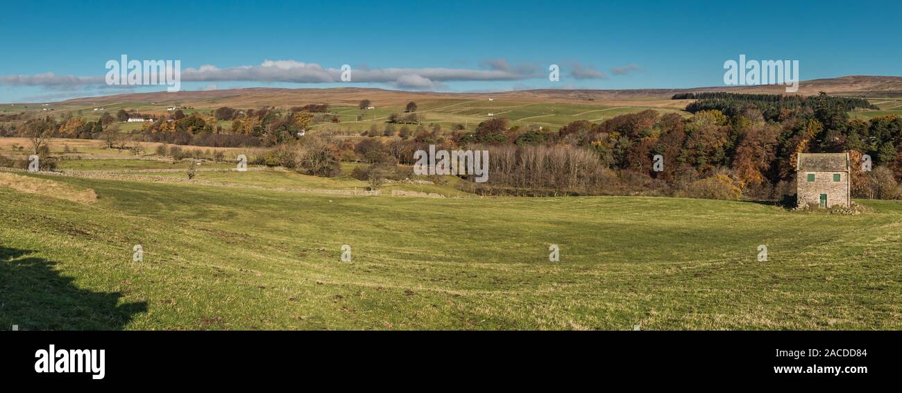 A panoramic view across Upper Teesdale from Ettersgill (left) to Bowlees (right), taken from Holwick on a fine late autumn day. Stock Photo