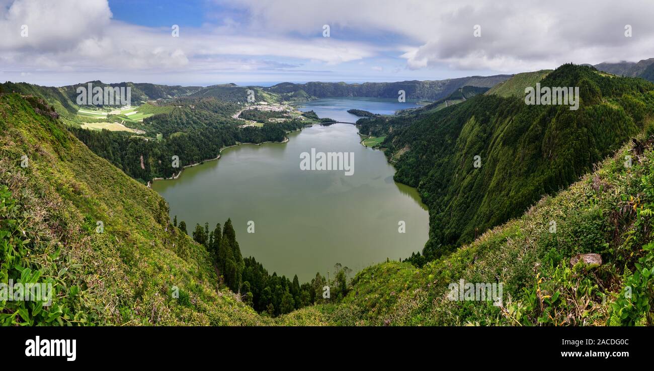 The huge Caldeira Sete Cidades with green and blue crater lake is a landmark of the Azores island of Sao Miguel, panoramic shot - Location: Portugal, Stock Photo