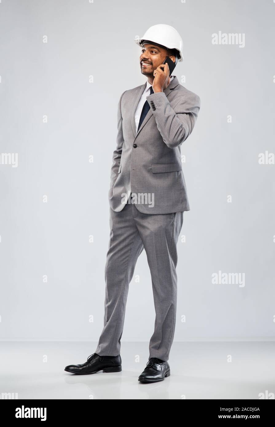indian male architect calling on smartphone Stock Photo