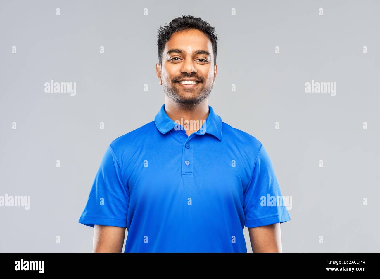 Man in blue polo shirt hi-res stock photography and images - Alamy