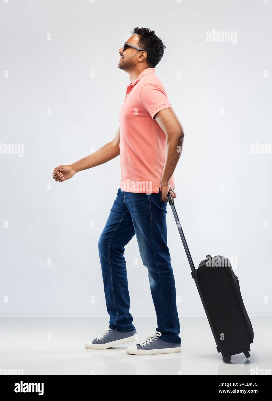 Indian man walking side view hi-res stock photography and images - Alamy