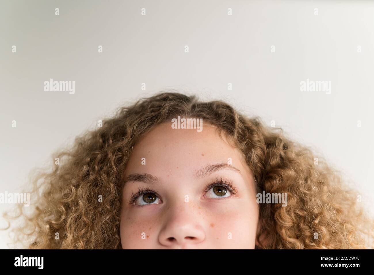 Girl looking up Stock Photo