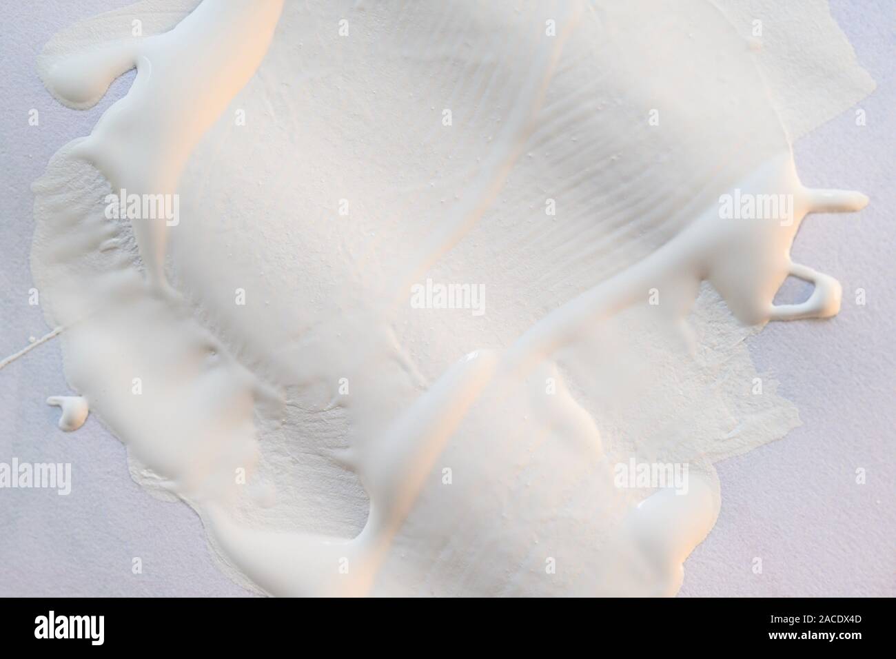 White paint on paper Stock Photo Alamy