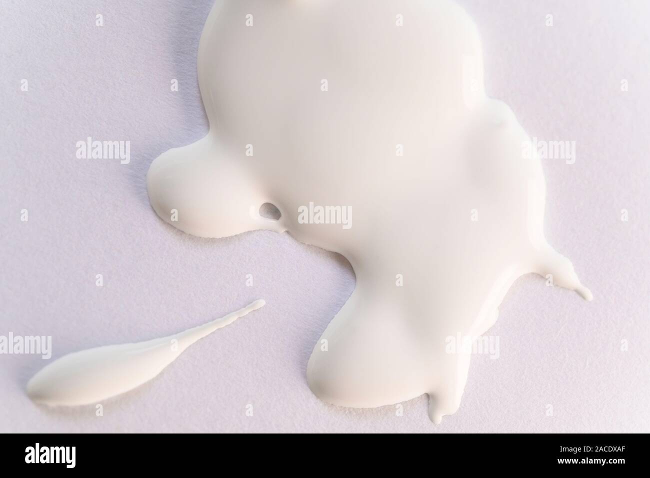 White paint on paper Stock Photo Alamy