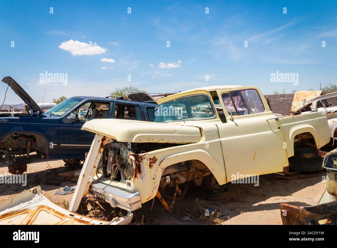 abandoned trucks in a junk yard in the desert near Phoenix Arizona USA