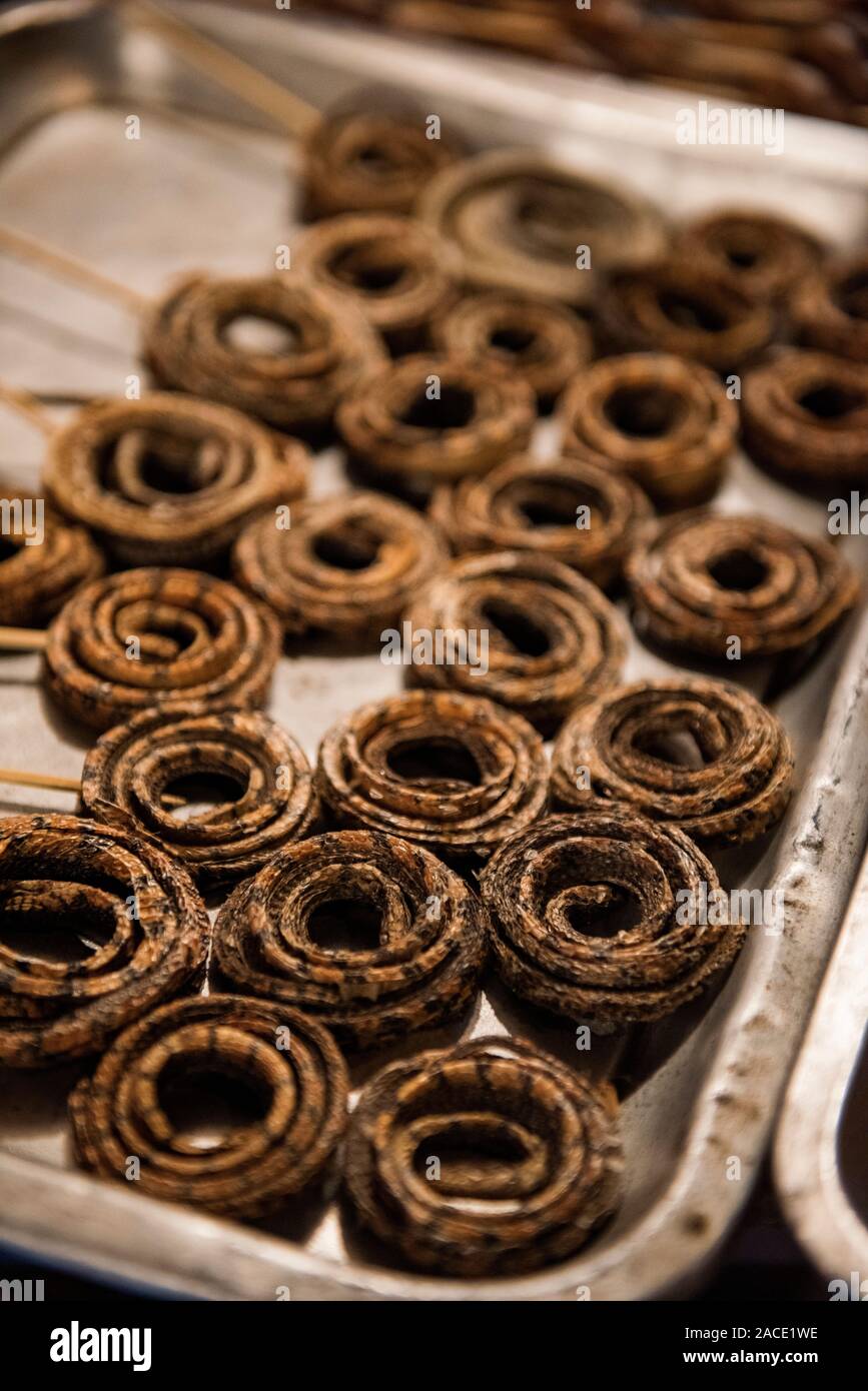 Grilled snakes in a food market in Beijing, China Stock Photo - Alamy