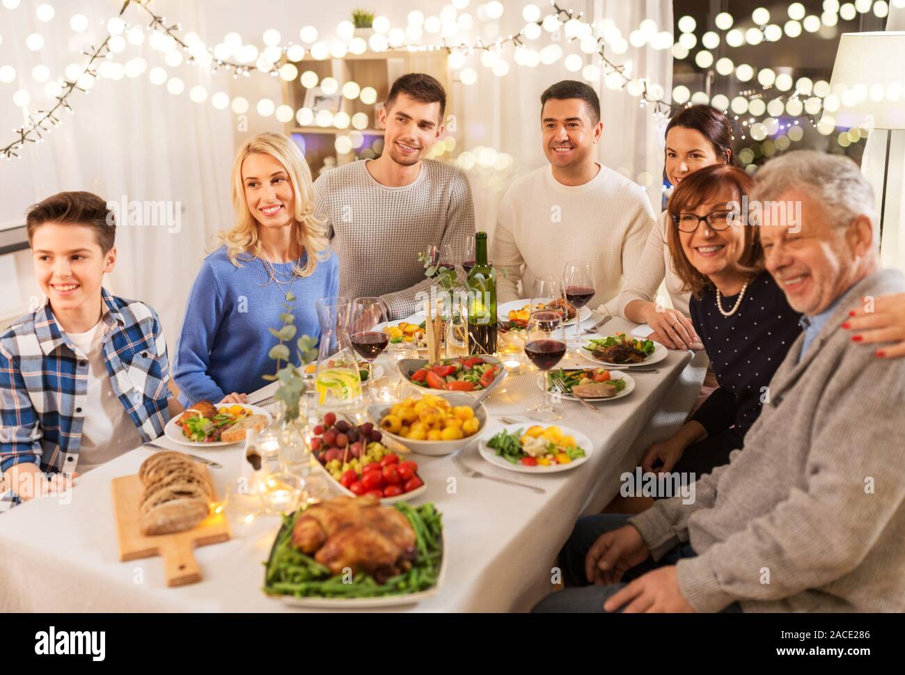 Happy Family Having Dinner Party At Home Stock Photo Alamy