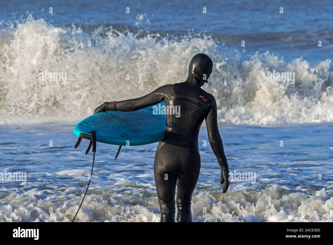 Young boy surfer in wetsuit hires stock photography and images Alamy