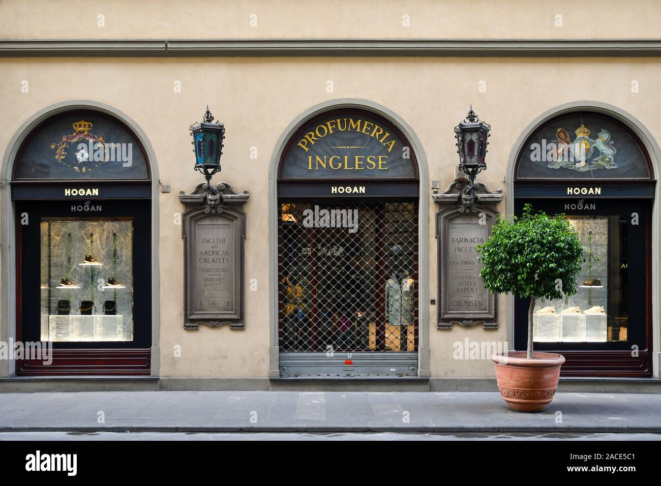Exterior of the former English Pharmacy Perfumery, founded in 1843 in the historic centre of Florence, today hosts the shoe shop Hogan, Tuscany, Italy Stock Photo