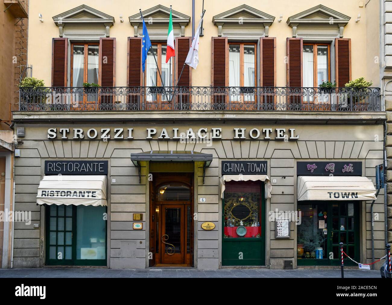 Façade of the Strozzi Palace Hotel with the entrance of the China Town Chinese restaurant in the historic centre of Florence, Tuscany, Italy Stock Photo