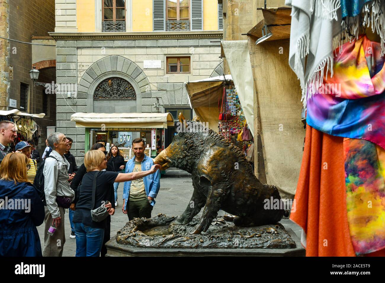 Group of tourists admiring the famous Fontana del Porcellino in the historic centre of Florence, Unesco World Heritage Site, Tuscany, Italy Stock Photo